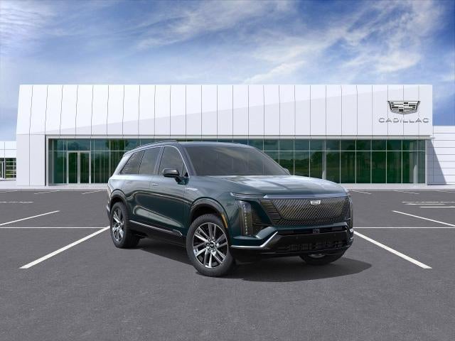2026 Cadillac VISTIQ Luxury in Emerald Lake Metallic — front three-quarter view