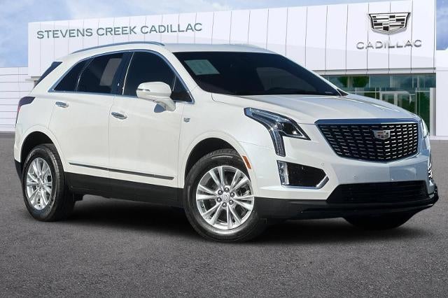 2025 Cadillac XT5 Luxury in Crystal White Tricoat — front three-quarter view
