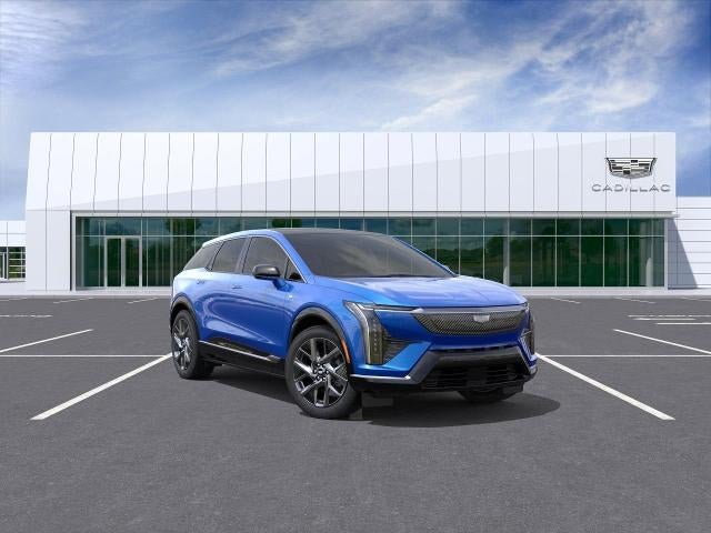 2026 Cadillac OPTIQ Luxury in Coastal Blue Metallic — front three-quarter view