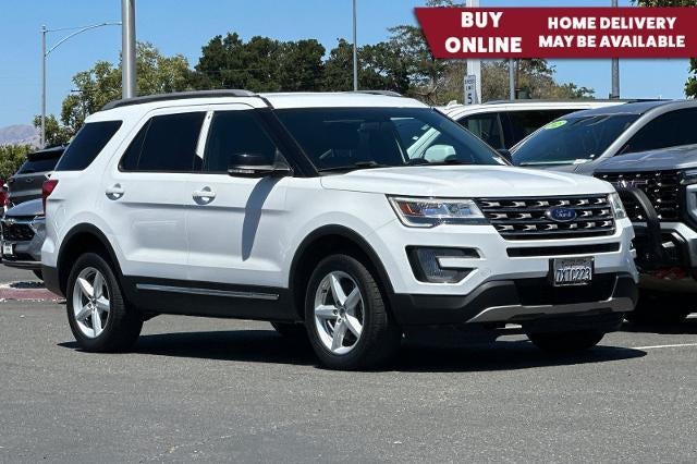 2017 Ford Explorer XLT in White — front three-quarter view